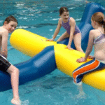 blue and yellow log roller in the pool